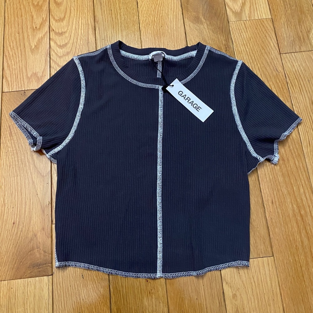 Garage grey exposed seam baby tee